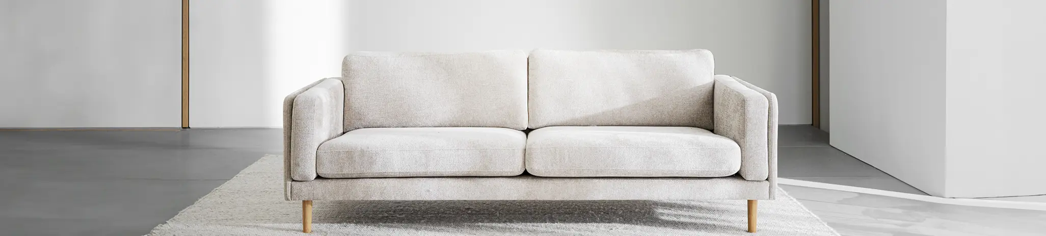 Beige 3-sitssoffor braden.