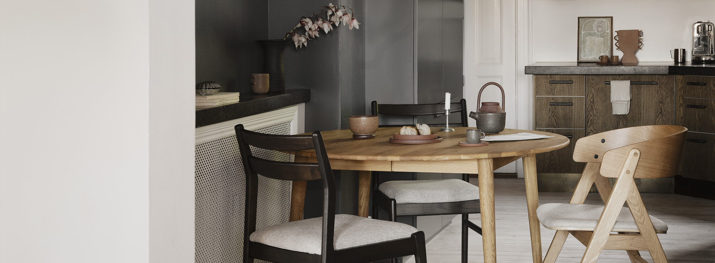 Tyler dining table oak round, kerwin chair.