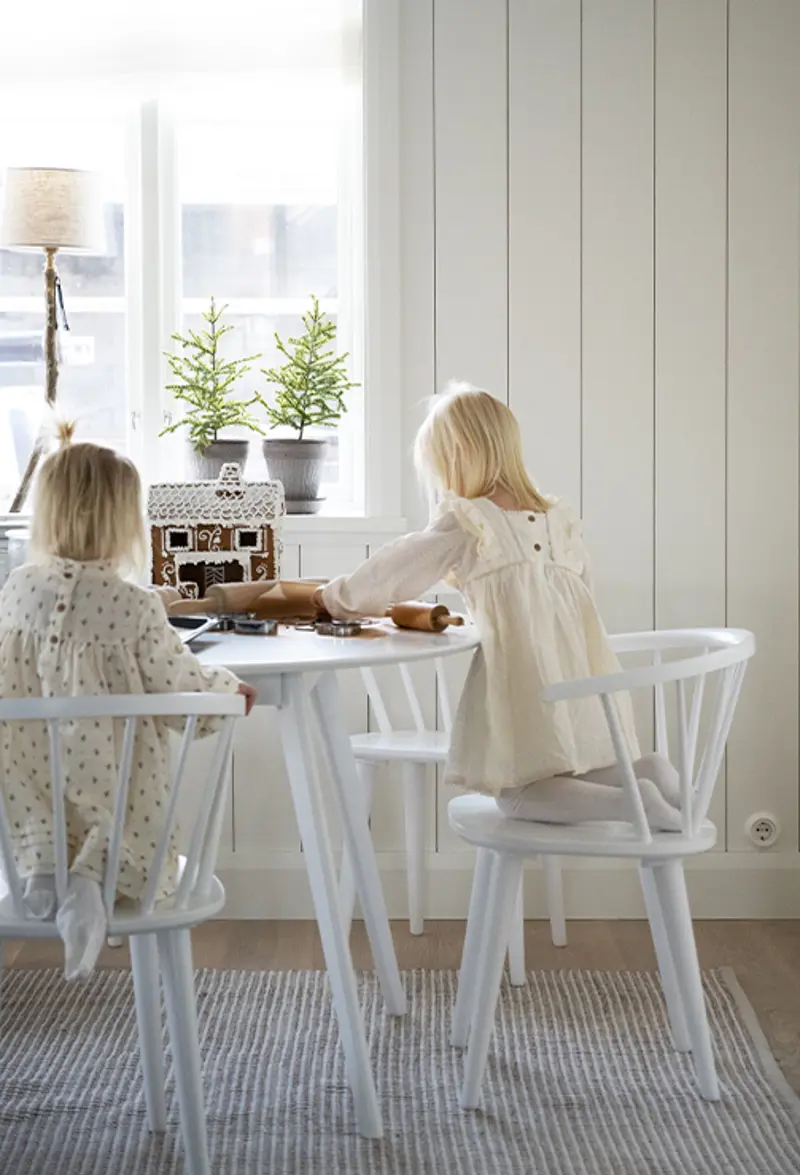 Carmen white chair yumi table gingerbread baking.