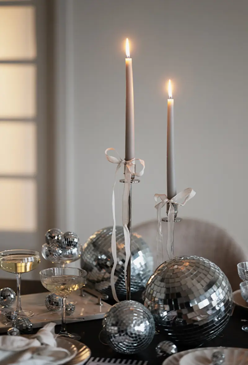 New years tabler setting chrome disco balls.