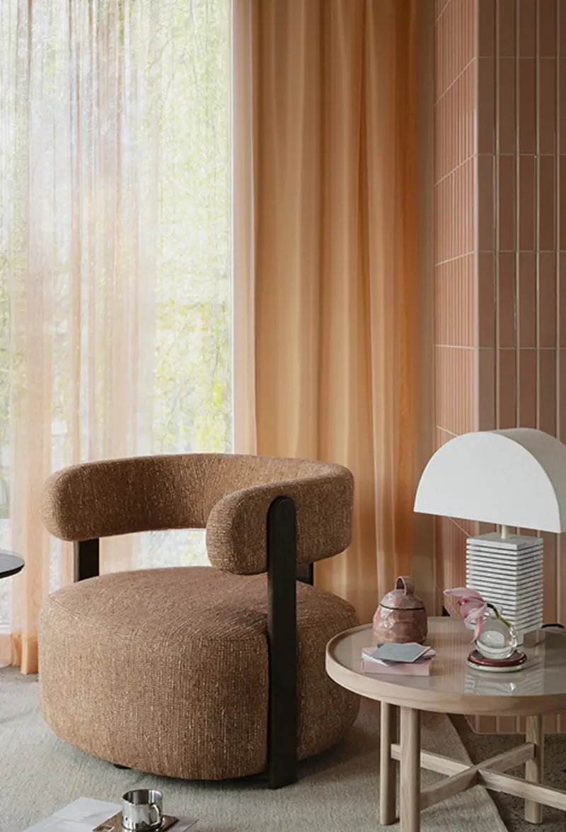 Jenison lounge chair amber brown.