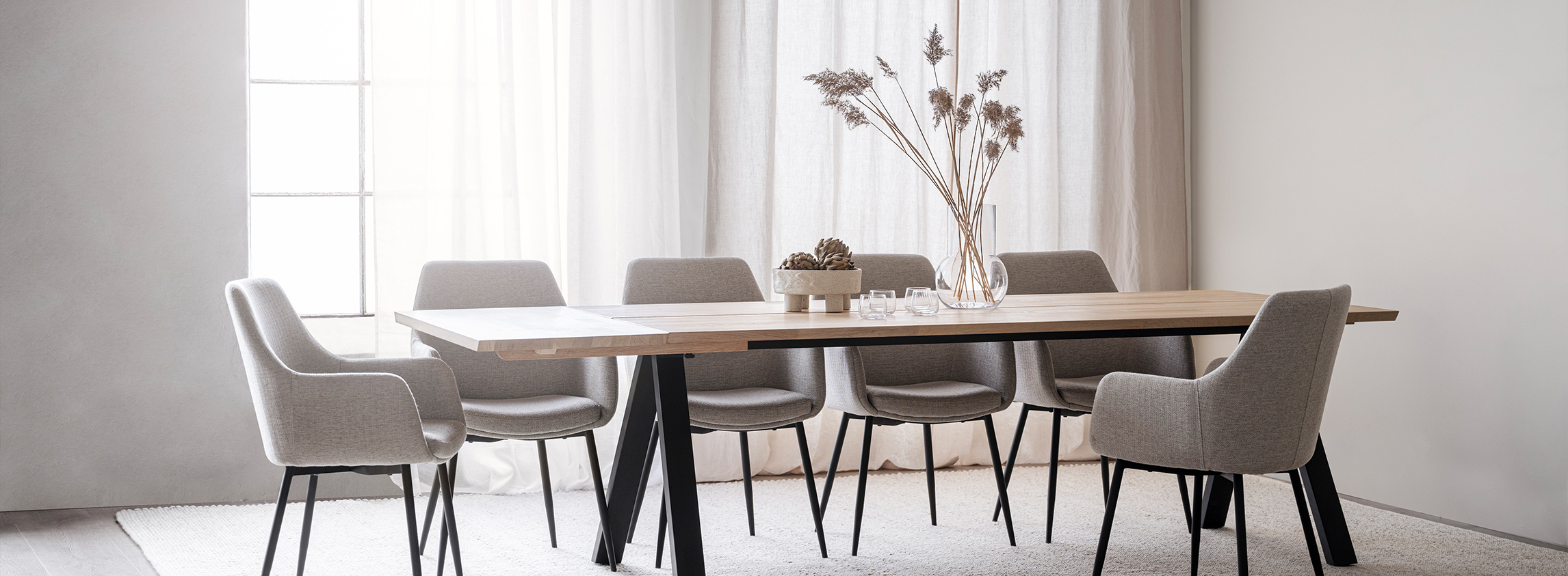 Carradale dining table Riely chair.